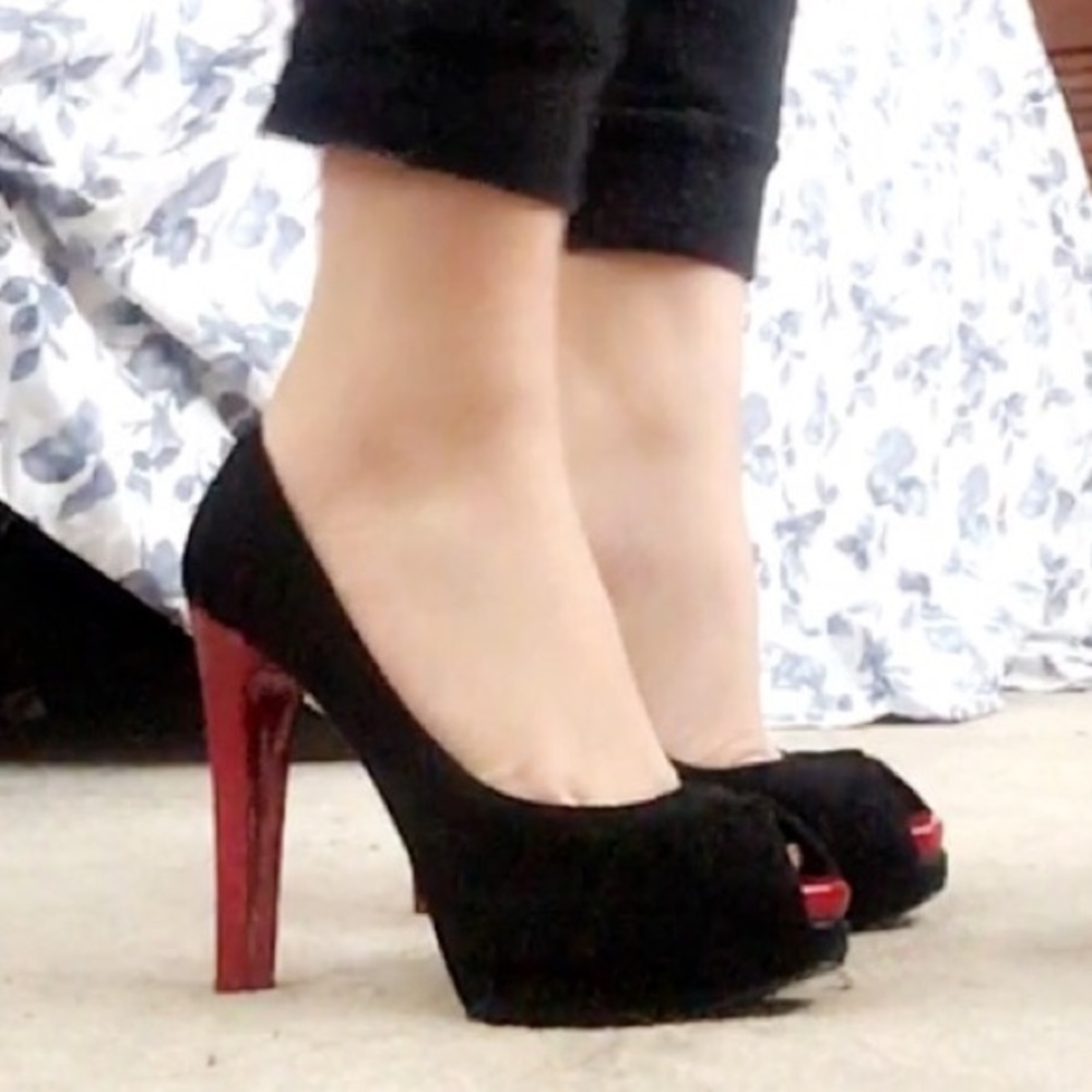 Stuart Weitzman peep toe pumps